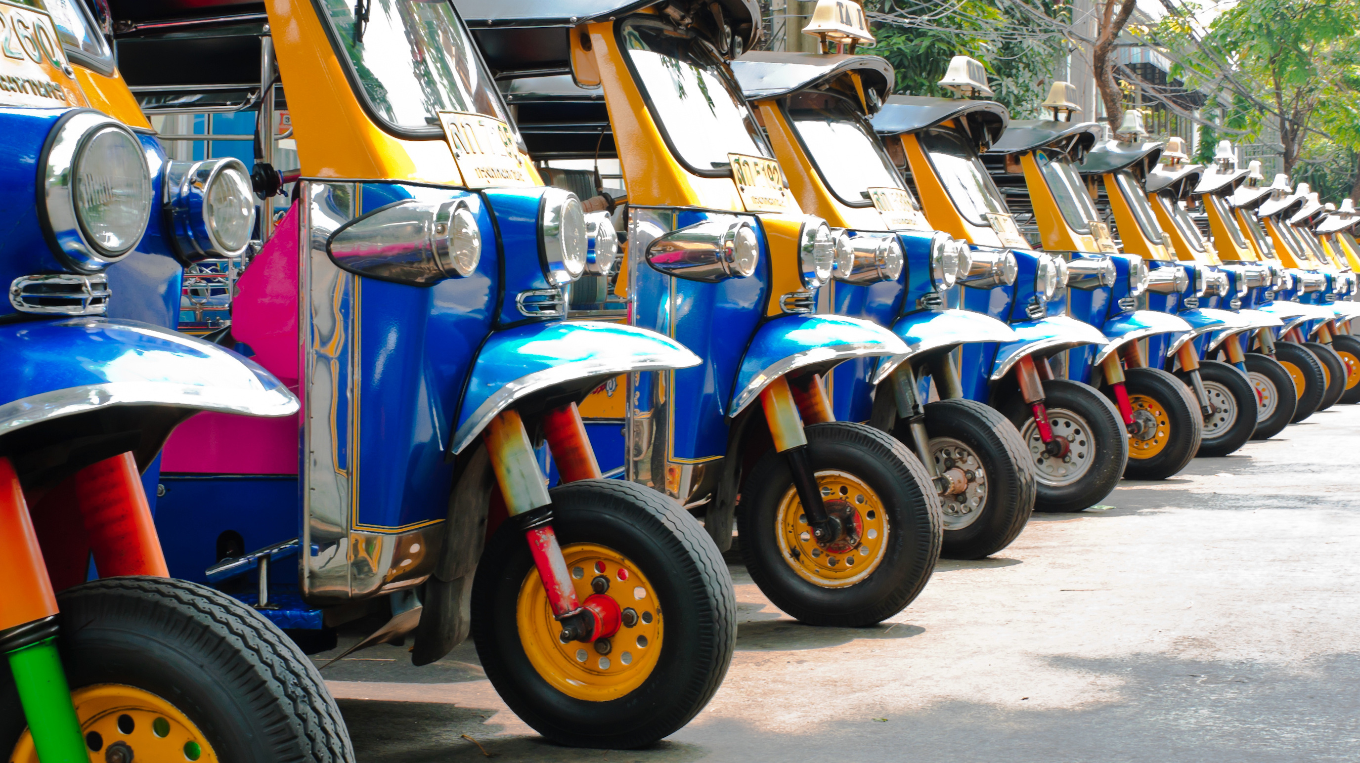 Tuk tuks taxi lined up in Bangkok, Thailand